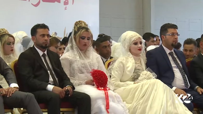 بالصور.. اربيل تحتضن عرسا جماعيا لـ 214 شابا وشابة